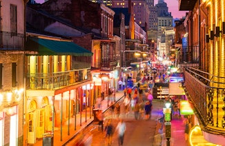 Pubs and bars with neon lights in the French Quarter, New Orleans USA